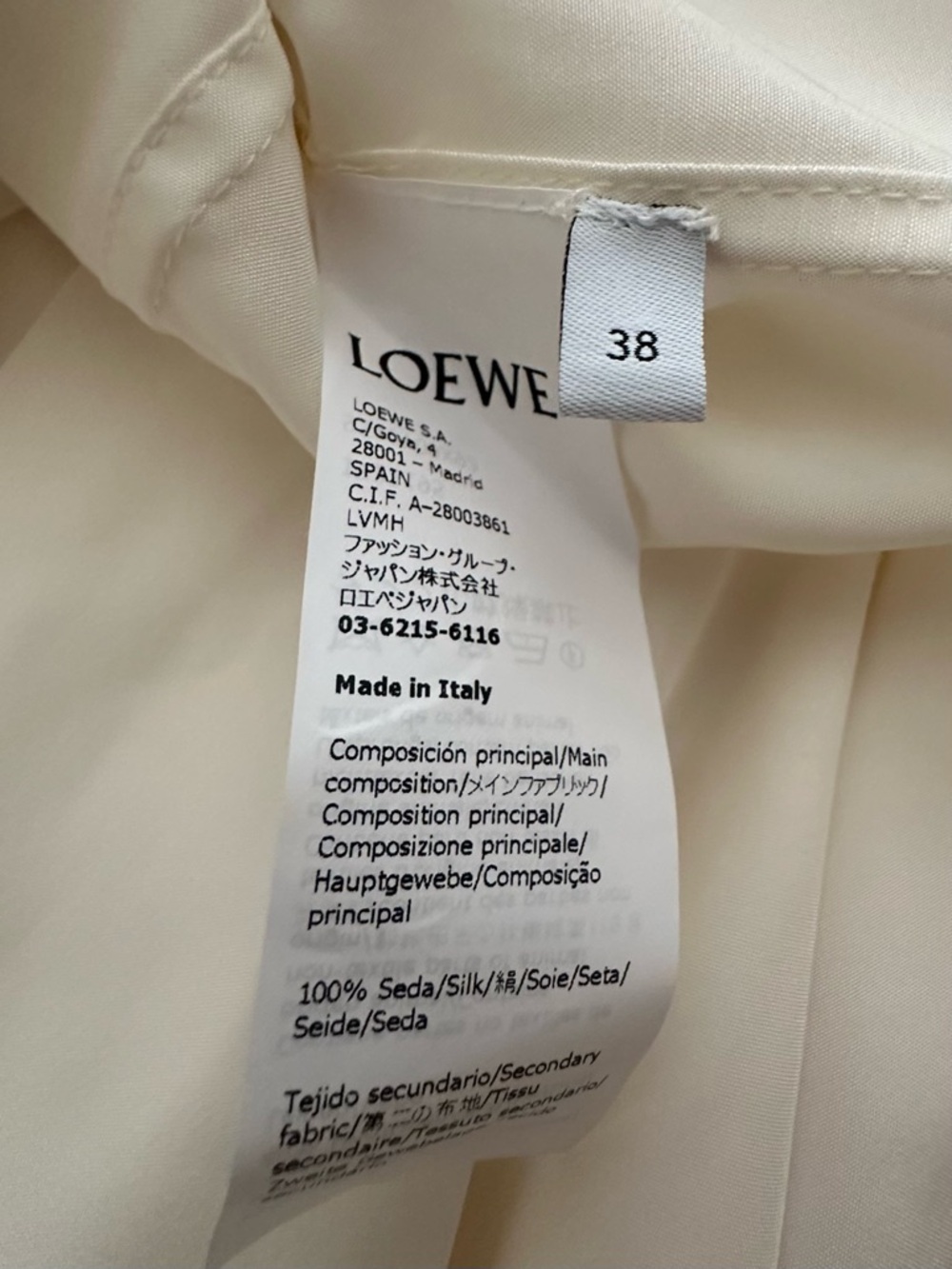 Loewe Cream Midi Dress with Puff Sleeves and asymmetric hem. - Picture 7 of 11
